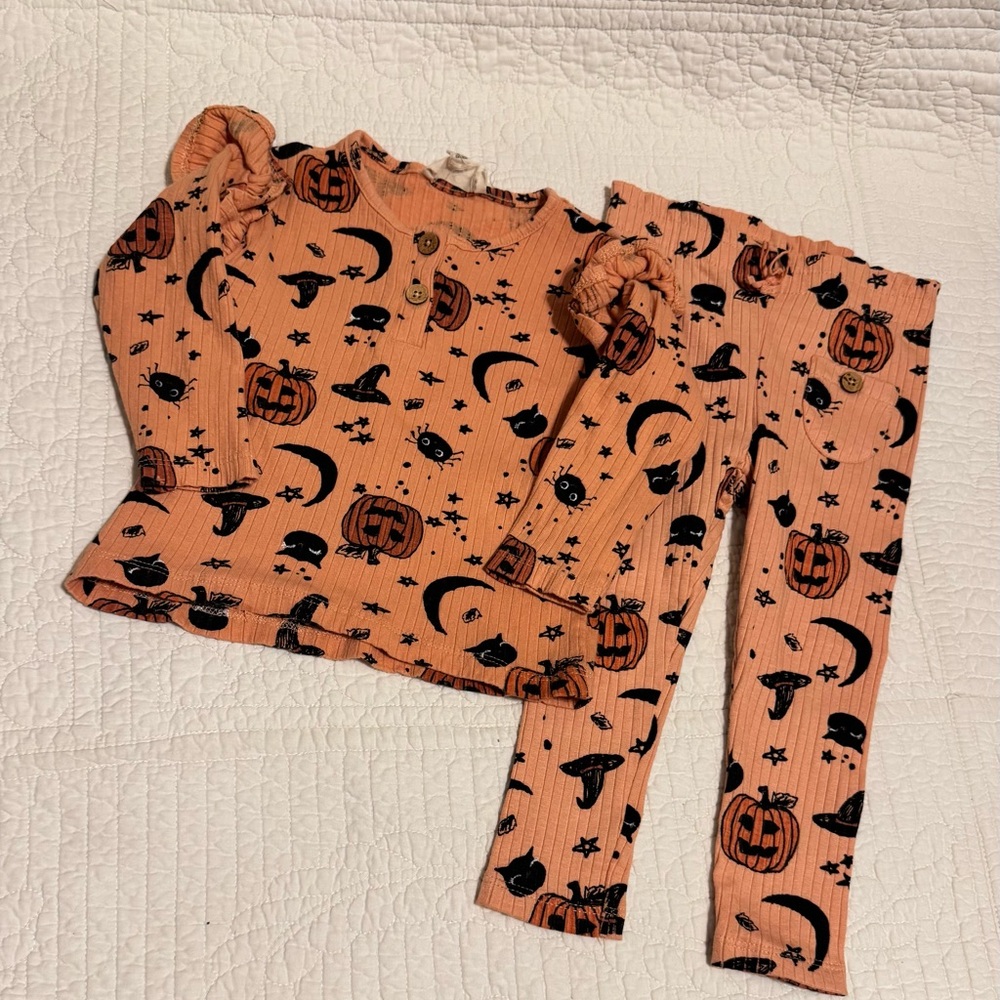 Jessica Simpson Halloween outfit Orange and Black